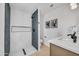 Modern bathroom with a tiled shower stall, floating vanity, and neutral color palette for a spa-like experience at 3037 E Pueblo Ave, Mesa, AZ 85204