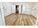 Bright bedroom with wood laminate flooring and neutral walls, offering a clean and spacious design at 318 S Crismon Rd # 83, Mesa, AZ 85208