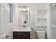 Bathroom featuring a single sink vanity with white countertops and a toilet at 3221 N 41St Pl, Phoenix, AZ 85018