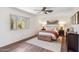 Cozy bedroom featuring natural light, warm accents, and wood floors at 3221 N 41St Pl, Phoenix, AZ 85018