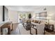 Bright living room with French doors leading to outdoor space and wood floors at 3221 N 41St Pl, Phoenix, AZ 85018