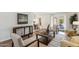 Comfortable living room featuring wood floors, bright light, and stylish accents at 3221 N 41St Pl, Phoenix, AZ 85018