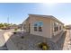 Attractive home with low-maintenance landscaping, complemented by gravel, cacti, and desert plants at 3301 S Goldfield Rd # 2034, Apache Junction, AZ 85119