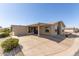 Exterior shot of the home with a covered carport, enhancing the property's practicality and curb appeal at 3301 S Goldfield Rd # 2034, Apache Junction, AZ 85119