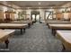 Well-lit game room with billiard tables, comfortable seating, and a welcoming atmosphere at 3301 S Goldfield Rd # 2034, Apache Junction, AZ 85119