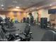 Modern fitness center with treadmills and stationary bikes, plus motivational wall art at 3301 S Goldfield Rd # 2034, Apache Junction, AZ 85119