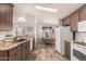 Charming kitchen features granite countertops and modern appliances, flowing into a cozy dining area at 3301 S Goldfield Rd # 2034, Apache Junction, AZ 85119