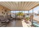 A well-lit and cozy covered patio with views of the community at 3301 S Goldfield Rd # 2034, Apache Junction, AZ 85119