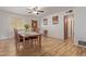 Charming dining room with wood table, seating for six, and wood floors at 3607 N 21St Ave, Phoenix, AZ 85015