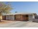 Charming brick home with mature trees, covered porch, and extended driveway at 3607 N 21St Ave, Phoenix, AZ 85015