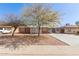 Charming brick home featuring mature trees, extended driveway, and a front porch at 3607 N 21St Ave, Phoenix, AZ 85015