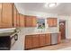 Functional kitchen featuring stainless steel appliances and wood cabinets at 3607 N 21St Ave, Phoenix, AZ 85015