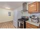 Bright kitchen with stainless steel appliances and ample counter space at 3607 N 21St Ave, Phoenix, AZ 85015