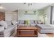 Inviting living room with a comfortable sectional sofa and neutral decor at 3607 N 21St Ave, Phoenix, AZ 85015