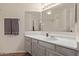Bathroom featuring vanity with new counter tops, and a large mirror above the sink at 3848 N 3Rd Ave # 1047, Phoenix, AZ 85013