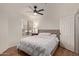 Comfortable bedroom with a neutral color palette, wood floors, and a ceiling fan at 3848 N 3Rd Ave # 1047, Phoenix, AZ 85013