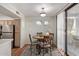 Inviting dining area with wood flooring and plenty of natural light at 3848 N 3Rd Ave # 1047, Phoenix, AZ 85013