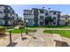 Inviting apartment complex with lush green spaces and community barbeque area at 3848 N 3Rd Ave # 1047, Phoenix, AZ 85013