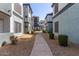 Apartment complex showcasing landscaped walkways between buildings at 3848 N 3Rd Ave # 1047, Phoenix, AZ 85013