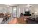 Bright living room with wood floors, modern furnishings, and natural light at 3848 N 3Rd Ave # 1047, Phoenix, AZ 85013