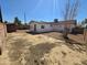 Large backyard perfect for outdoor activities and customization with landscaping at 3932 W Lawrence Ln, Phoenix, AZ 85051
