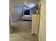 Spacious bedroom with wood flooring throughout, plenty of room and a modern ceiling fan at 3932 W Lawrence Ln, Phoenix, AZ 85051