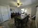 Open floor plan from dining room leads into kitchen area at 3932 W Lawrence Ln, Phoenix, AZ 85051