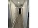 This hallway features recessed lighting and tile floors at 3932 W Lawrence Ln, Phoenix, AZ 85051