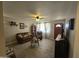 Inviting living room with light walls, modern flooring, and comfortable furnishings at 3932 W Lawrence Ln, Phoenix, AZ 85051