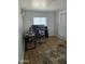Cozy office space with room for multiple computers and natural light at 3932 W Lawrence Ln, Phoenix, AZ 85051