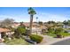 Charming two-story home with a well-manicured front yard and a three car garage at 4066 E Grandview St, Mesa, AZ 85205