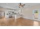 Bright kitchen features white cabinets, stainless appliances, and granite countertops at 4066 E Grandview St, Mesa, AZ 85205