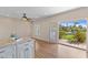 Bright kitchen features white cabinets and granite countertops with easy outdoor access at 4066 E Grandview St, Mesa, AZ 85205