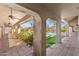 A covered patio featuring tiled flooring, offering a great space for outdoor enjoyment and relaxation at 4066 E Grandview St, Mesa, AZ 85205