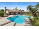 Inviting backyard pool and spa with lush landscaping and desert charm, perfect for relaxation and entertainment at 4066 E Grandview St, Mesa, AZ 85205