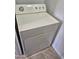 Whirlpool white dryer with a front door at 4231 E Roeser Rd, Phoenix, AZ 85040