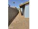 View of the side yard of the home at 4231 E Roeser Rd, Phoenix, AZ 85040