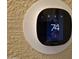 ecobee Smart thermostat on wall showing the indoor temperature set to 74 at 4231 E Roeser Rd, Phoenix, AZ 85040