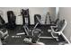 Well-equipped ARC gym with treadmills, elliptical machines, and free weights for fitness enthusiasts at 4701 E Walatowa St, Phoenix, AZ 85044