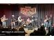 Live concert with band performing on stage in front of an audience at 4701 E Walatowa St, Phoenix, AZ 85044