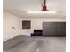 Spacious garage features ample storage cabinets, providing organization and functionality at 4701 E Walatowa St, Phoenix, AZ 85044