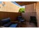 Balcony seating with cushioned rocking chairs, perfect for outdoor relaxation at 5525 E Thomas Rd # K6, Phoenix, AZ 85018