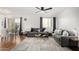 Cozy living room with stylish sofas, decorative pillows, glass top coffee table and neutral rug at 5525 E Thomas Rd # K6, Phoenix, AZ 85018