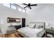 This bedroom features high ceilings, a ceiling fan, and a modern design aesthetic at 6527 W Bloomfield Rd, Glendale, AZ 85304