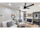 Sitting area showcasing stylish chairs, ample mirrors and hardwood floors at 6527 W Bloomfield Rd, Glendale, AZ 85304