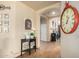 Inviting foyer with decorative accents, tile flooring, and neutral paint at 6963 W Aurora Dr, Glendale, AZ 85308