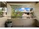 Private balcony featuring views of lush landscaping and mature trees, creating a peaceful outdoor space at 7009 E Acoma Dr # 2134, Scottsdale, AZ 85254