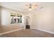 Bedroom featuring carpet, neutral paint, ceiling fan, and door leading to another room at 7009 E Acoma Dr # 2134, Scottsdale, AZ 85254