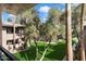 A tranquil green area is surrounded by lush trees and plants for the residents to enjoy in a park-like setting at 7009 E Acoma Dr # 2134, Scottsdale, AZ 85254