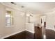 Bright living room features hardwood floors, neutral walls, and modern lighting at 7009 E Acoma Dr # 2134, Scottsdale, AZ 85254